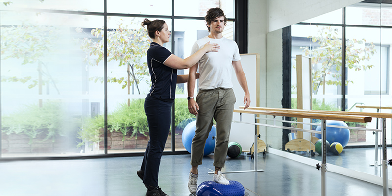 Student Lucy Bunge and client David Byrne in the Rehab Gym, UniSA Physiotherapy Clinic.