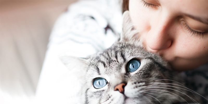 Woman with pet cat