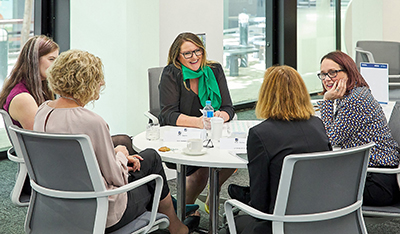 UniSA Women in MBA (WiMBA) scholars discussing leadership diversity at a WiMBA Scholars Round Table Event hosted at the City West Campus.