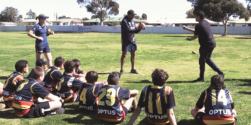 UniSA is building on its strong 30-year relationship with Anangu (Pitjantjatjara and Yankunytjatjara) (APY) communities through a new program that has developed a series of first language AFL coaching resources. 