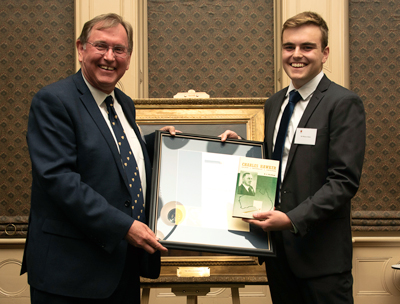 Head of St Mark’s College Professor Don Markwell presents William Gillett with the scholarship. 