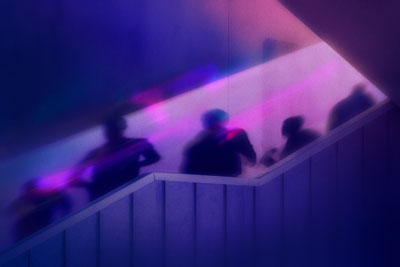 Decorative image in purple tones of people on a staircase