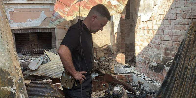 Adam Weinert pictured in the ruins of his Lobethal home, gutted by fire in 2020. Photo courtesy of Henning Klövekorn.