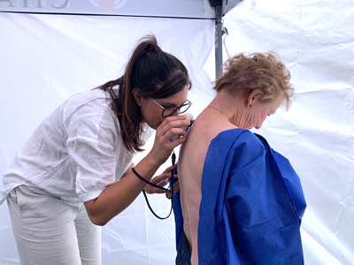 A nurse undertaking skin cancer checks using AI in a pop-up clinic at Victor Harbor.