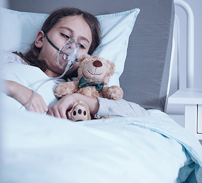 Young girl in hospital bed